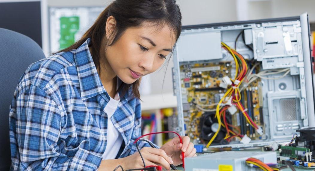 Woman working on computer. 